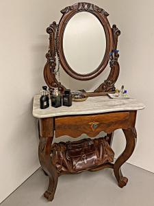 a dressing table with a mirror and a sink at Loft Designer in Neuhausen am Rheinfall