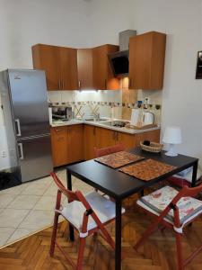 Kuchyňa alebo kuchynka v ubytovaní Apartament on Kazimierz + 4 fotografie