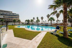 Πισίνα στο ή κοντά στο Apartamento primera linea de Playa Serena