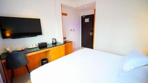 Postel nebo postele na pokoji v ubytování D Loft Hotel