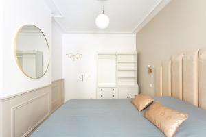 Letto o letti in una camera di SUITE RAPHAEL Tour Eiffel