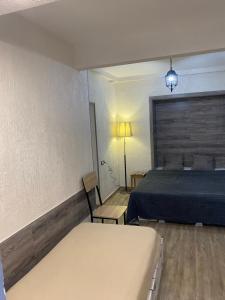 Postel nebo postele na pokoji v ubytování Mini Hostel N.Tigranyan 5