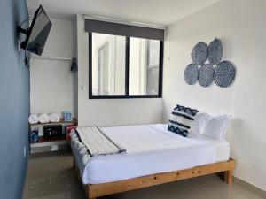 Letto o letti in una camera di Aldeazul by Andiani Travel