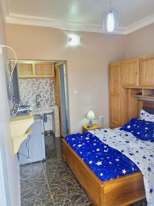 Giường trong phòng chung tại Gallaghers city ( YameHome )