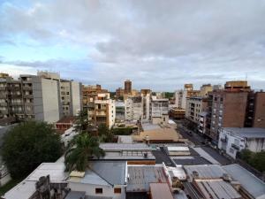a view of a city with tall buildings at LA SAN JUAN en Zona Norte in San Miguel de Tucumán