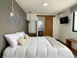 Letto o letti in una camera di Aldeazul by Andiani Travel
