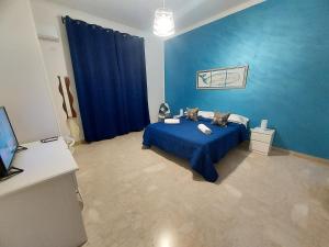 Posteľ alebo postele v izbe v ubytovaní La Casa del Moro - Al Politeama