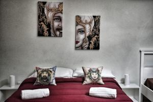 Posteľ alebo postele v izbe v ubytovaní La Casa del Moro - Al Politeama