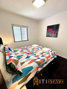 Bold in Bruce - 1bd 1bth 1csp客房内的一张或多张床位