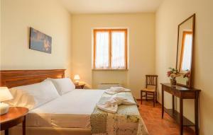 A bed or beds in a room at Appartamento Smart 4