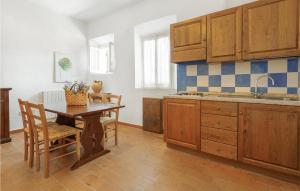 A kitchen or kitchenette at Appartamento Smart 4