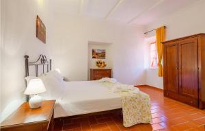 A bed or beds in a room at Appartamento Smart 4