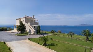 a villa with a view of the ocean at Villa Itis Superb Residence with Balcony & Panoramic View in Neapoli Voion