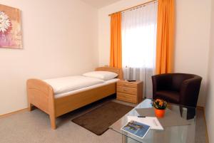 Postel nebo postele na pokoji v ubytování Garni Hotel Leitl GmbH