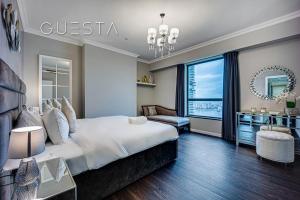 Postel nebo postele na pokoji v ubytování Jumeirah Beach Residence, Dubai Marina