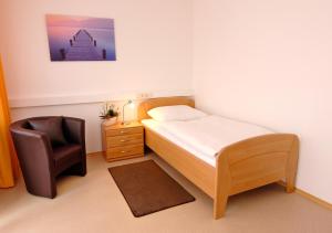 Postel nebo postele na pokoji v ubytování Garni Hotel Leitl GmbH