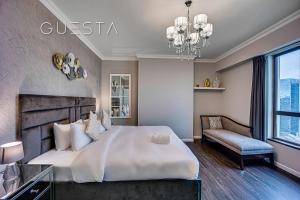 Postel nebo postele na pokoji v ubytování Jumeirah Beach Residence, Dubai Marina