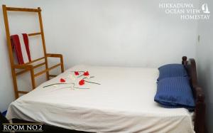 Postel nebo postele na pokoji v ubytování Hikkaduwa Ocean View Homestay
