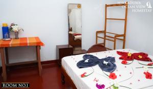 Voodi või voodid majutusasutuse Hikkaduwa Ocean View Homestay toas