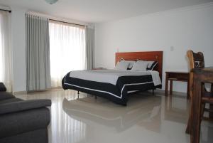 Krevet ili kreveti u jedinici u objektu COLOMBIA-Hotel Hontibon