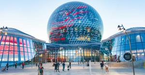 a group of people standing in front of a building at Апартаменты в ЖК Only Sun in Prigorodnyy