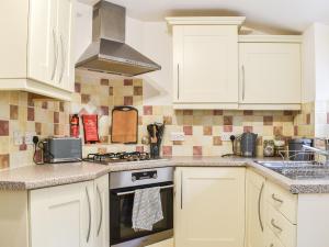 Kjøkken eller kjøkkenkrok på Spaniels Cottage