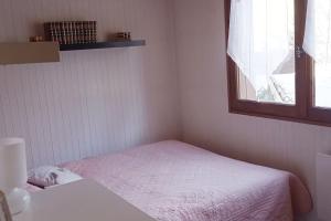Кровать или кровати в номере Appartement idéal pour une famille.