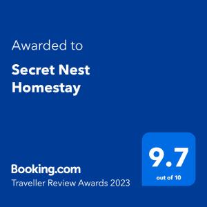 Certifikat, nagrada, logo ili neki drugi dokument izložen u objektu Secret Nest Homestay