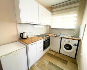 Nhà bếp/bếp nhỏ tại Peace Apartments +22 ảnh