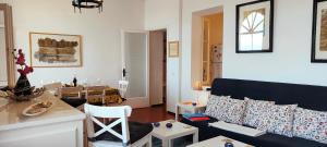 Posedenie v ubytovaní Apartamento con jardín a 11 metros de la playa. B3.