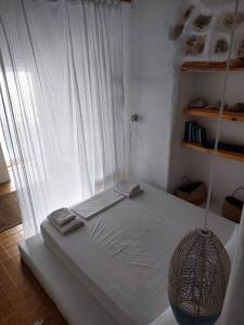 Voodi või voodid majutusasutuse Astrofegia guest house toas