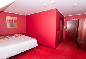 Postel nebo postele na pokoji v ubytování Hotel Medūna