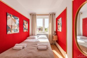 Fotografia z galérie ubytovania Horyzont Apartamenty -Domek na Sosnowej z tarasem v destinácii Kołobrzeg