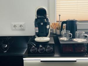 a mixer sitting on top of a kitchen counter at Haus Maensel in Kelberg