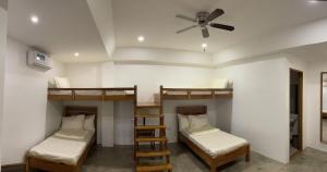 Postel nebo postele na pokoji v ubytování P&B Residences Legazpi