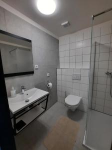 Koupelna v ubytování Apartmány Resort Na Horské