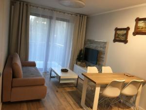 Svetainės erdvė apgyvendinimo įstaigoje Apartament Avangarda