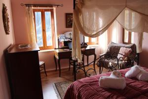 Posteľ alebo postele v izbe v ubytovaní Gorianades Traditional House