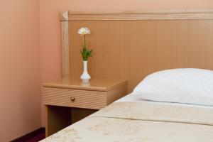 Posteľ alebo postele v izbe v ubytovaní Optima Deluxe Kryvyi Rih