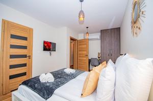 Posteľ alebo postele v izbe v ubytovaní InPoint Spacious Apartments near Main Square & Kazimierz District