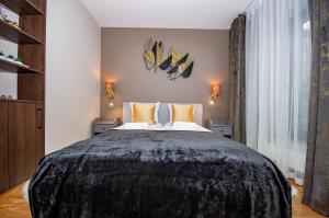 Posteľ alebo postele v izbe v ubytovaní InPoint Spacious Apartments near Main Square & Kazimierz District