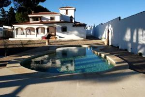 Piscina de la sau aproape de CÁDIZ - GANESHA acogedor apartamento en Chiclana de la Frontera, España +21 fotografii