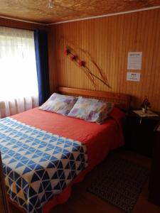 Postel nebo postele na pokoji v ubytování "Mi Hostal Tu Casa" Hostal Familiar SOLO EMPRESAS, TURISTAS y VIAJEROS Espacio para BICICLETAS y MOTOS