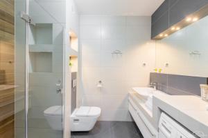 Kúpeľňa v ubytovaní Horyzont Apartamenty - Osiedle Bursztynowe