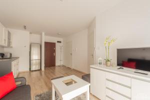 Kuchyňa alebo kuchynka v ubytovaní Horyzont Apartamenty - Osiedle Bursztynowe