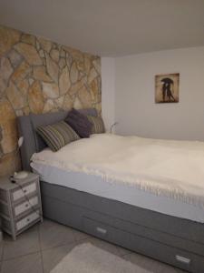 Postel nebo postele na pokoji v ubytování Apartment sv.nikole
