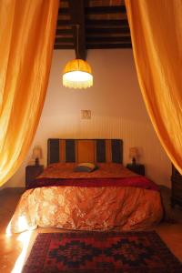 A bed or beds in a room at La Casina di Cagnano