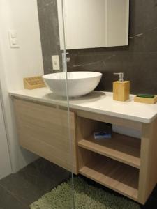 a bathroom with a sink and a bowl on a counter at A estrenar en Punta Carretas in Montevideo