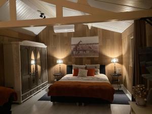 Ένα ή περισσότερα κρεβάτια σε δωμάτιο στο B & B d’ Uitwijkerpoort