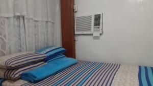 Postel nebo postele na pokoji v ubytování Beachaus Resort